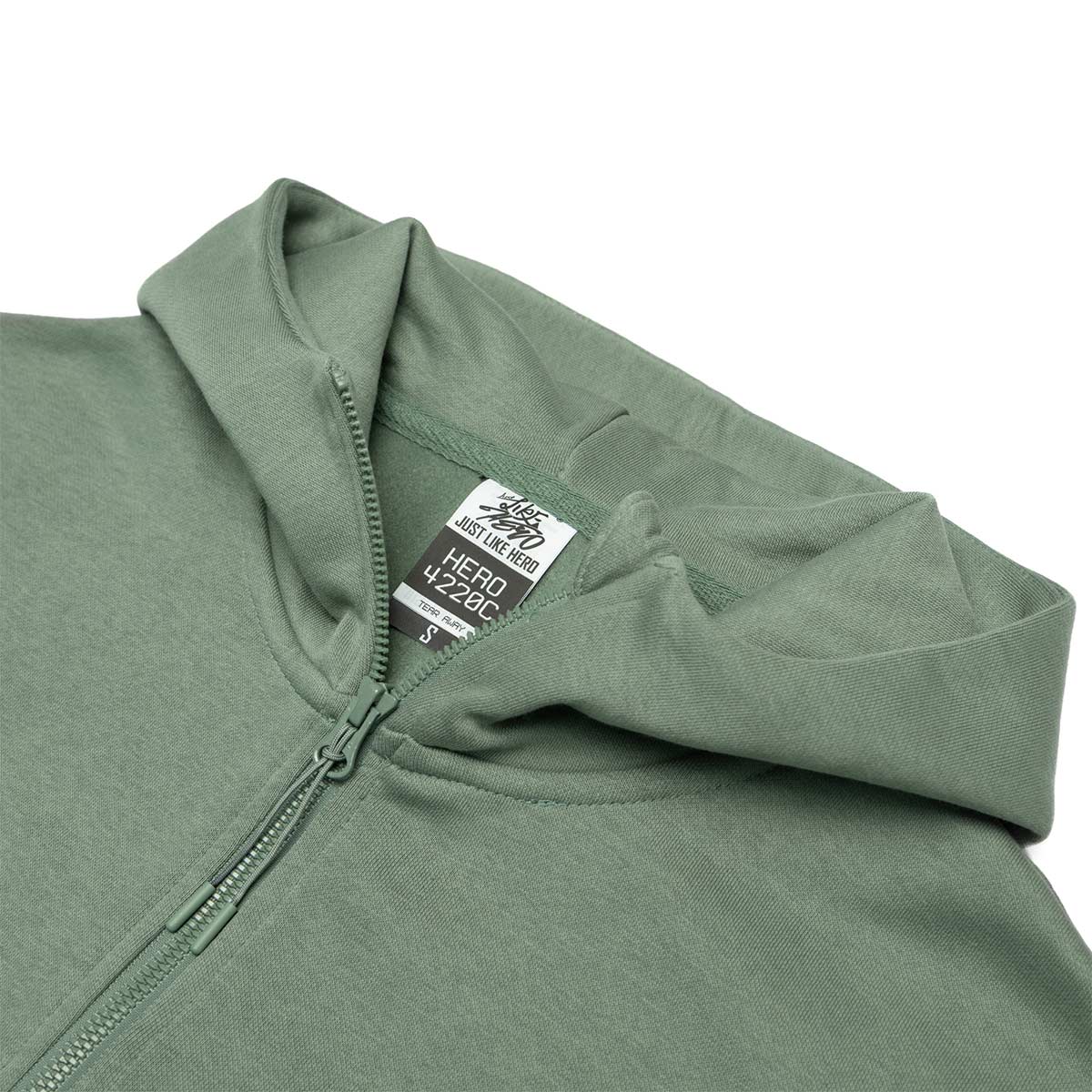 Green hoodie with a brand tag on a white background
